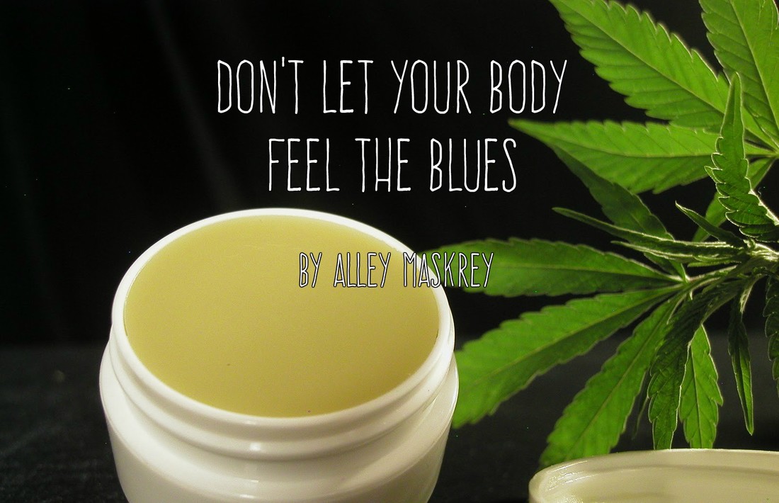 Open jar of cannabis-infused balm beside a green cannabis leaf, with text reading Don’t Let Your Body Feel the Blues by Alley Maskrey.
